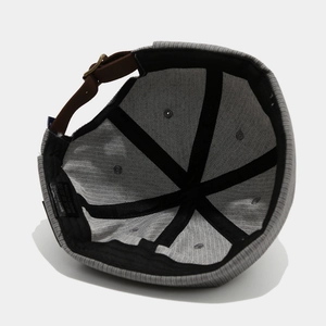 Inside view of grey 100% cotton docker hat showing reinforced seams and leather strap