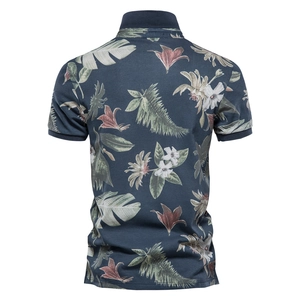 Navy blue short sleeve polo shirt featuring tropical floral print shown from the back view