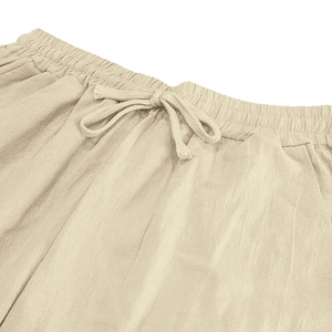 Détail du pantalon en lin beige pour hommes avec taille élastique à cordon et poches