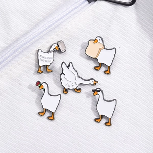 5-piece set of funny white goose enamel pins with humorous memes on canvas background