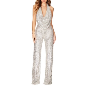 Detail of silver sequined halter neck jumpsuit with deep V-neckline and shiny texture