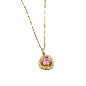Elegant gold titanium necklace with pink gemstone pendant and sparkling diamond halo