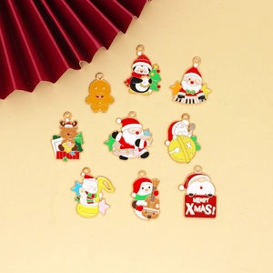 Flat lay detail of nine Christmas enamel alloy charms including Santa and Snowman
