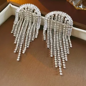 Silver drop earrings with geometric tassels and sparkling cubic zirconia for evening wear