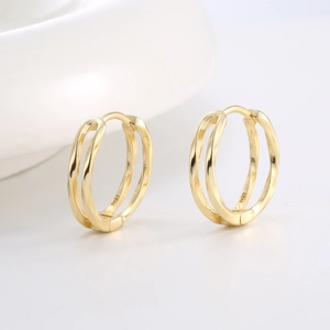 Elegant hollow S925 sterling silver earrings plated in 14K gold with minimalist design