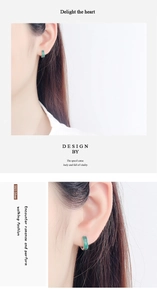 Detail view of S925 sterling silver hoop earrings with faceted green agate for women and men