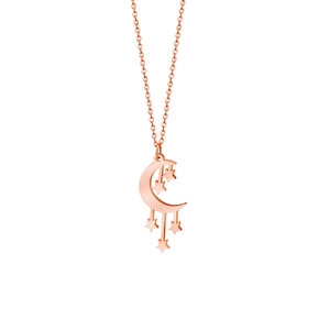 Macro detail of rose gold moon and stars hollow pendant with delicate O-chain