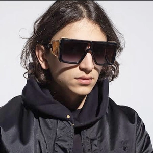 Steampunk wrap-around sunglasses with gradient lenses and decorative metal temples