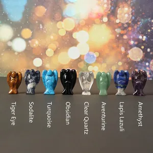 Set of eight 1.5 inch natural crystal angel carvings in diverse gemstone materials
