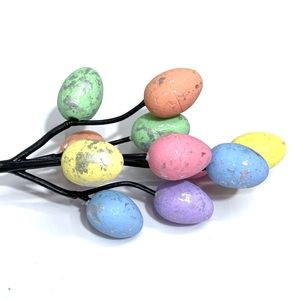 Easter egg tree branches with colorful metallic speckled eggs for holiday table decor