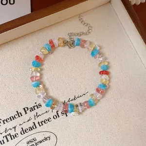 Colorful natural crystal chip bracelet with white flower charm and adjustable silver clasp