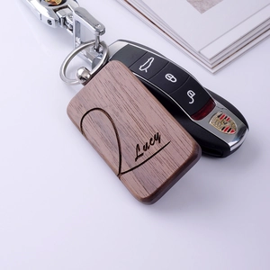 Customized walnut wood car keychain with engraved name and silver metal buckle