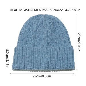 Size measurements for light blue cable knit beanie showing 23cm height and 22cm width