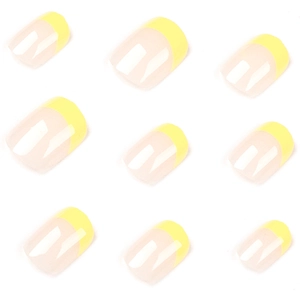 Faux ongles French manucure jaune brillant avec base nude et forme rectangulaire