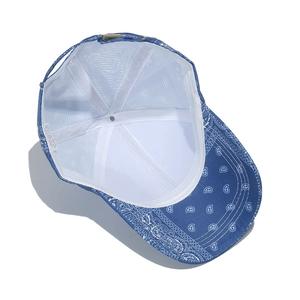 Inside view of navy blue bandana print baseball cap showing lining and stitching details