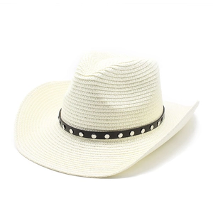 Detail of off-white straw cowboy hat featuring a black faux leather band with silver studs
