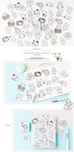 Macro view of cute cartoon white cat stickers set for DIY scrapbooking and journals