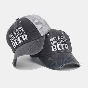 Distressed ponytail baseball cap with mesh back and Just A Girl Who Loves Beer embroidery