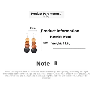 Detail shot showing 3.5cm by 12cm dimensions and 15.8g weight of wooden drop earrings