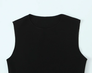 Close-up of crew neckline and shoulder stitching on a black sleeveless elastic top