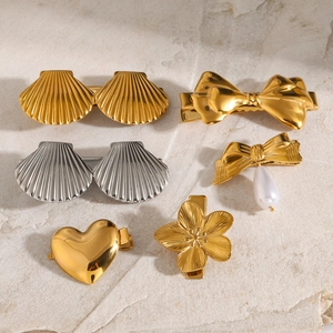 Detailed collection of 18k gold and silver stainless steel hair clips with butterfly designs