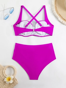Chic rose pink two-piece high-waisted bikini set with underwire top and crisscross straps