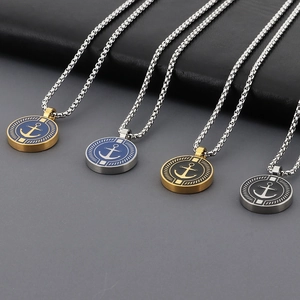Detail view of nautical anchor compass pendants in four colorways with stainless steel chains