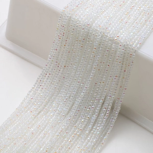 Macro detail of high-shine iridescent faceted crystal beads for DIY jewelry making