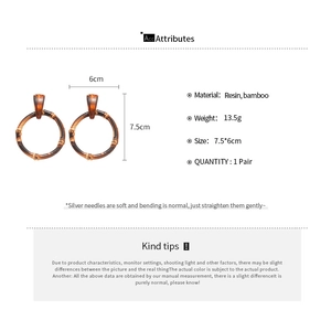 Infographic showing bamboo resin drop earrings size 7.5x6cm and 13.5g weight details