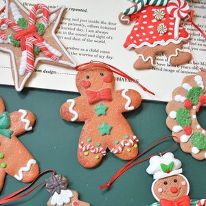 Christmas clay gingerbread man and tree ornaments set with red hanging strings