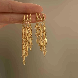 Golden wheat-inspired long tassel earrings featuring glossy metallic fringe for women