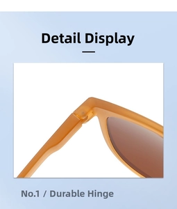Detail showing the durable metal hinge of these stylish amber folding sunglasses