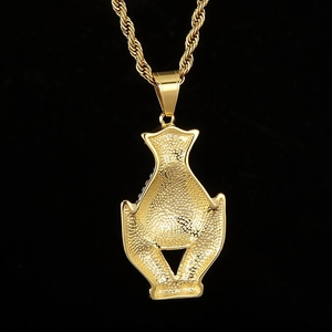 Macro shot of hip hop money bag pendant featuring iced-out gold texture and twist rope chain