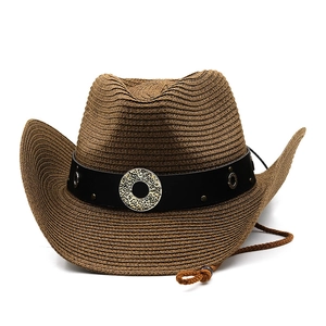 Detail of brown cowboy hat featuring a black leather band with vintage metal buckle