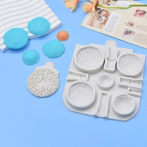 White silicone coral texture cake mold for Halloween baking with detailed mushroom patterns