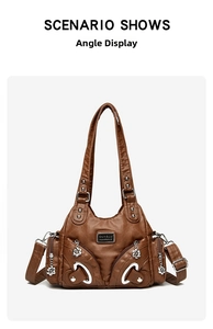 Detail view of brown vintage soft leather tote bag with silver zippers and multi-pocket design