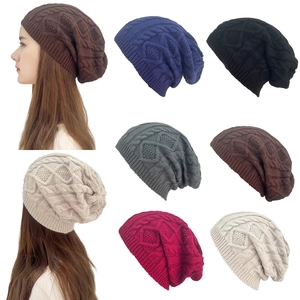 Detailed cable knit pattern on beanie hats in multiple colors for autumn and winter
