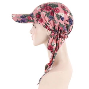 Side view of pink floral headscarf hat with sun visor and adjustable back ties