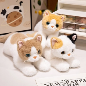 Trio of realistic lying plush cats in orange, brown and calico faux fur styles