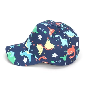 Detailed side view of navy blue kids baseball cap with colorful cartoon dinosaur prints