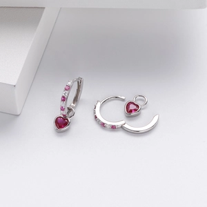 Detail view of detachable S925 silver hoop earrings with red heart shaped zircon gemstone