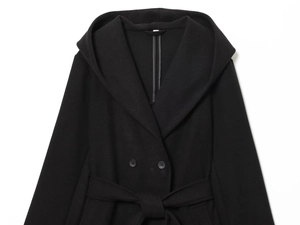 Detail shot of black hooded double-breasted coat with wool texture and belted waist