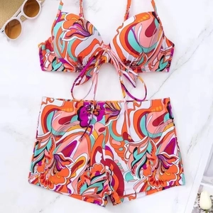 Two-piece floral graffiti swimwear set with halter bikini top and high waist boyleg shorts