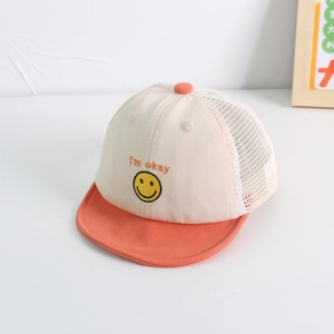 Detail of baby mesh sun hat featuring smiley embroidery and breathable white mesh back
