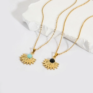 Gold plated stainless steel sunburst necklaces with natural blue and black stones