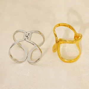 Minimalist geometric hollow gold and silver stainless steel bangles with hinged closures