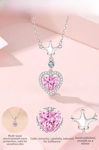 Detail of pink heart cubic zirconia pendant with crown bail and mirror polished finish
