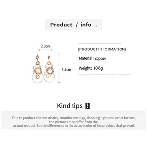 Detailed view of geometric circle earrings showing 7.5cm height and 2.8cm width dimensions