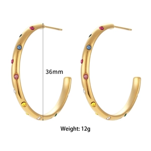 Detail view of 36mm 18K gold-plated C-shaped earrings with colorful zircon inlay