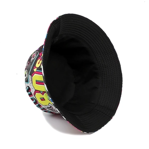 Detail of reversible bucket hat showing retro 80s pop art print and black inner lining